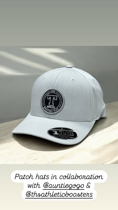 Travis Mathew hats with woven logo patch